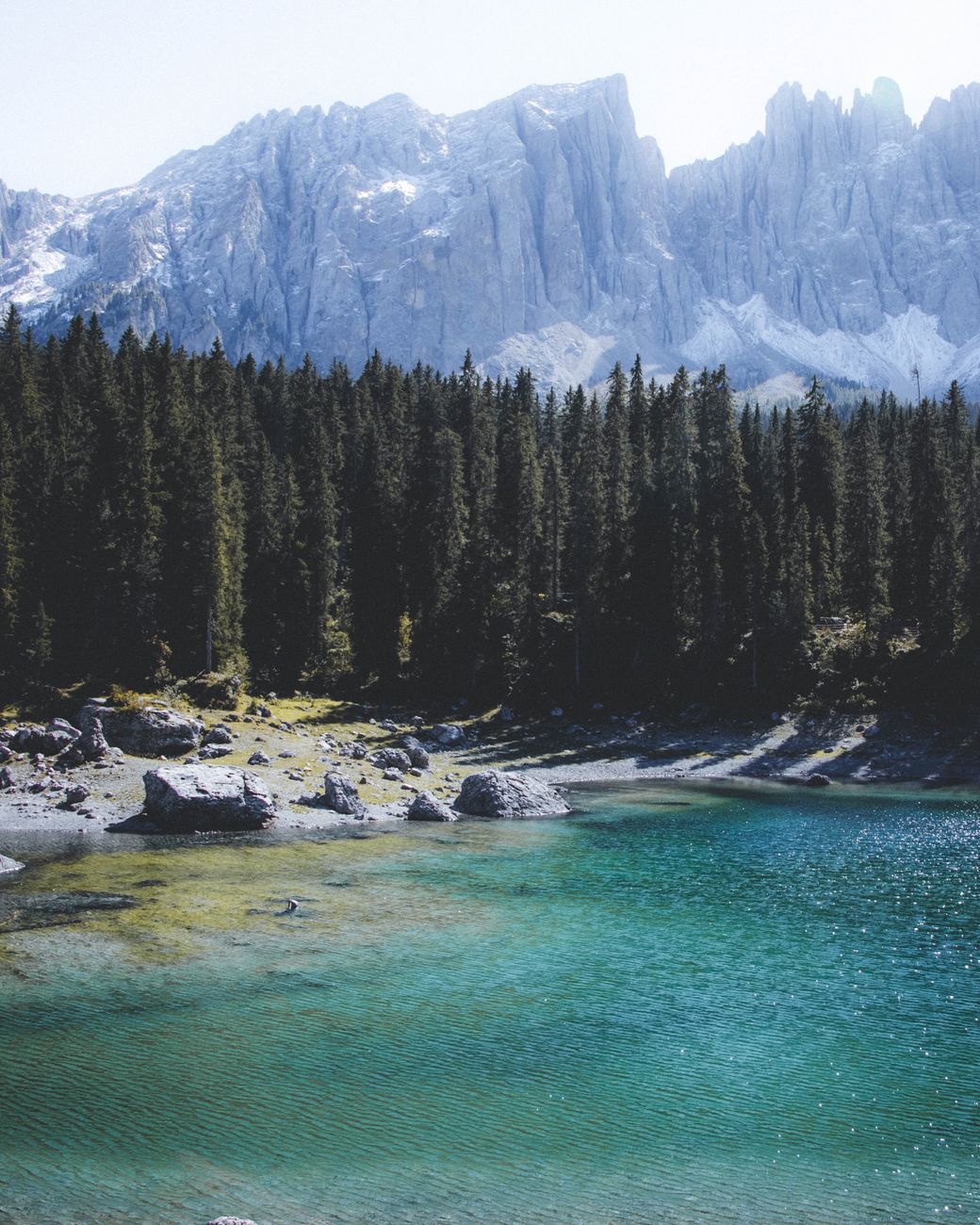 Alpine mountains with tranquil crystal lake